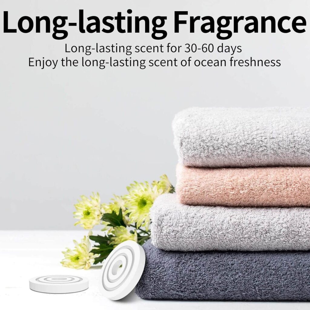 FlyHit aroma discs with towels and flowers showing long-lasting fragrance feature